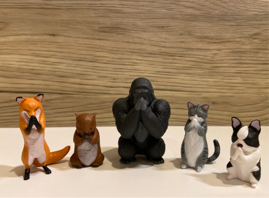 Praying Figurines