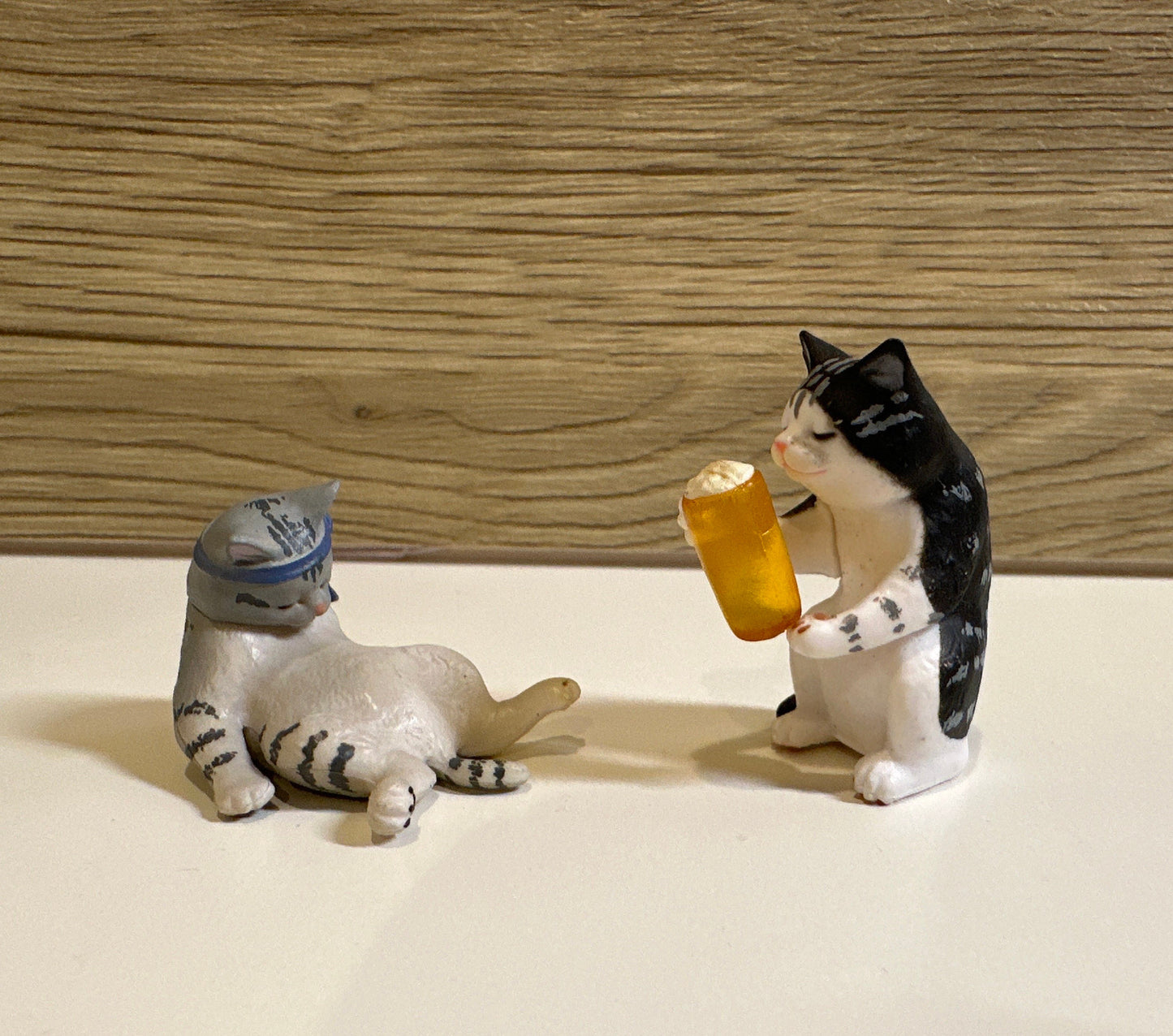 Drunk cat figurines