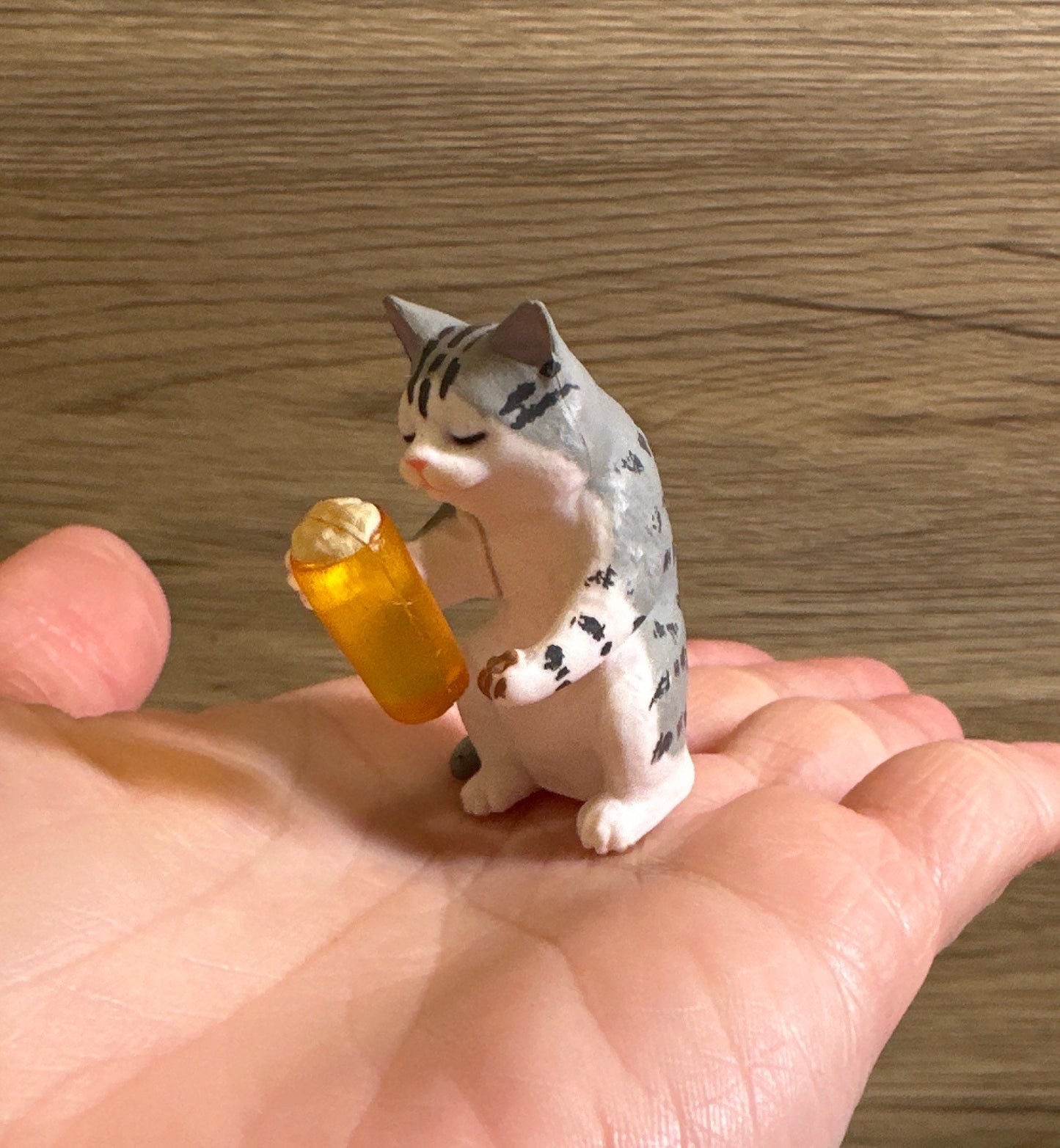 Drunk cat figurines