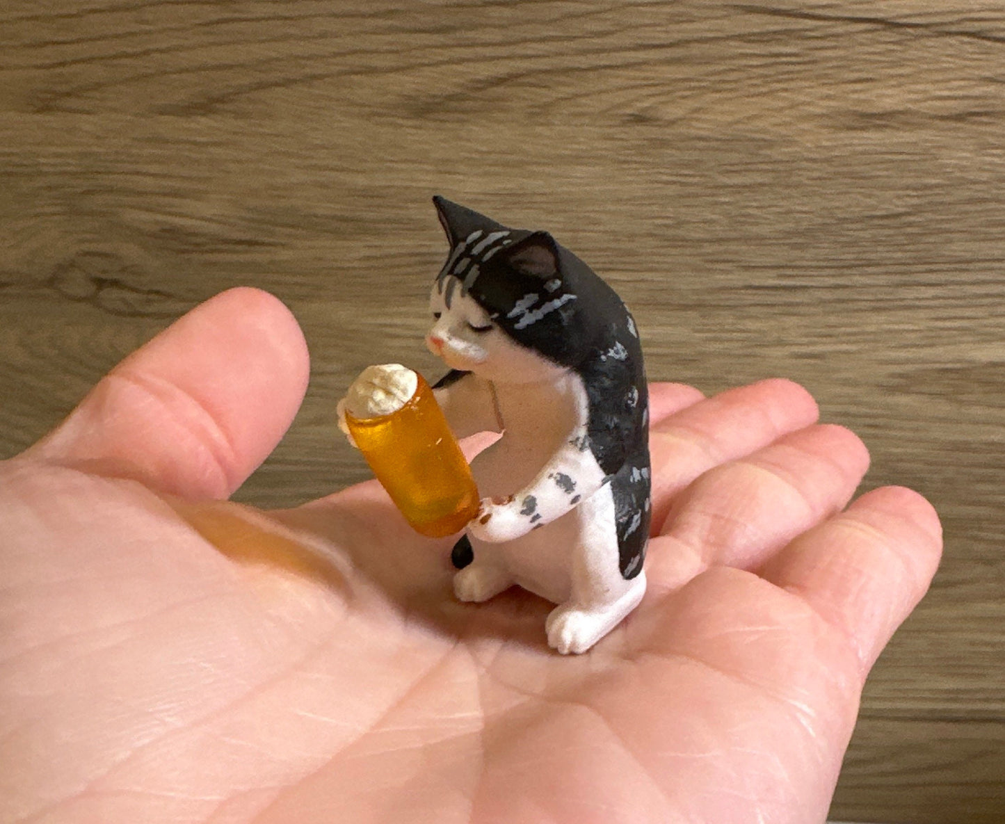 Drunk cat figurines