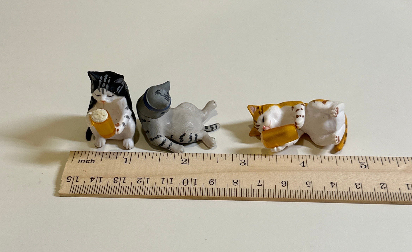 Drunk cat figurines